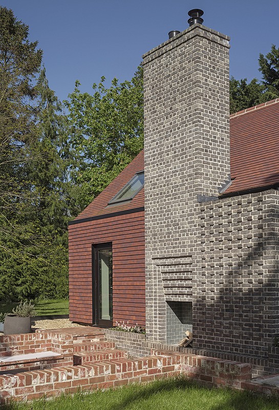 Outside fireplace brick detail chimney hung tiles